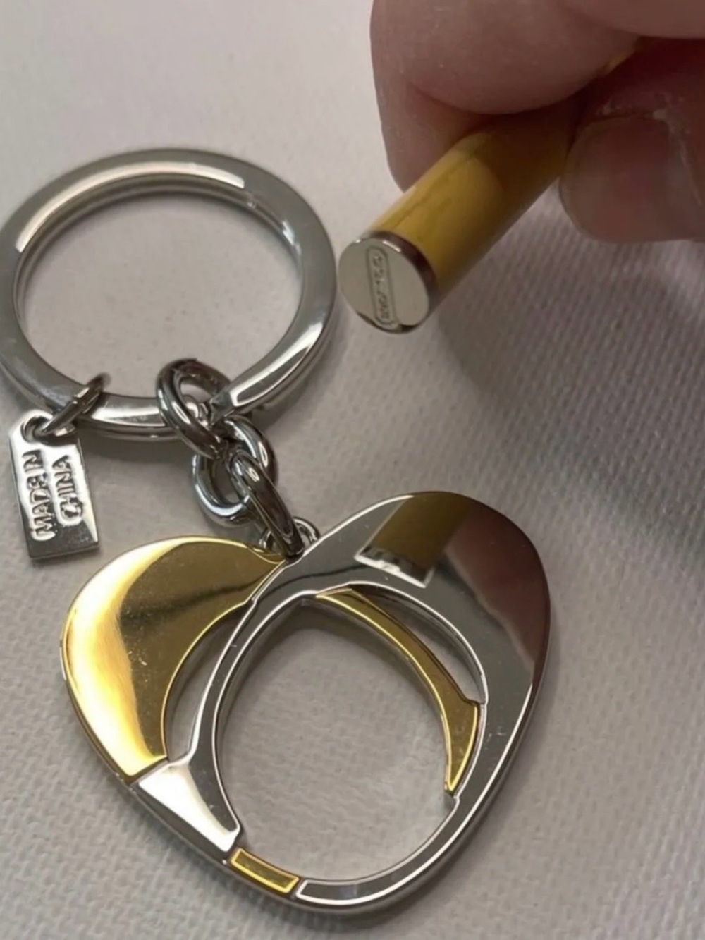 Coach Silver and Gold Heart
Keychain with Cream Coach Pen NWOT - Picture 4 of 5